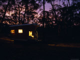 Buy Welcoming Lit Up Gypsy Wagon in the Forest at Sunset, Australia at AllPosters.com
