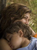 Buy Woman with Her Sleeping Child at Anahola Beach, Hawaii at AllPosters.com