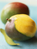 Buy Two Mangos, One Partly Sliced at AllPosters.com