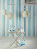 Plates, Cutlery, Water Bottle on White Table, Lanterns
