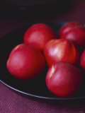 Buy Several Nectarines in a Black Dish at AllPosters.com