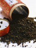Tea Leaves Tipped out in Front of Tea Box