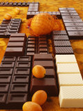 Still Life of Chocolate Bars and Citrus Fruit
