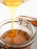 Buy Organic Honey Running into a Honey Jar at AllPosters.com