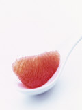 Grapefruit Segment on White Spoon