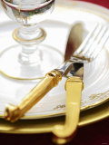 Festive Place Setting with Gold Cutlery