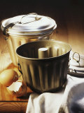 Pudding Moulds on Wooden Table