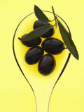 Black Olives in Olive Oil with Sprig of Olive Leaves