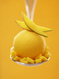 Mango Sorbet with Fresh Fruit on a Spoon