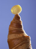 A Croissant with a Butter Curl