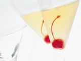 Two Drinks with Cocktail Cherries