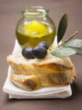 Buy Olive Sprig with Black Olives on White Bread, Olive Oil Behind at AllPosters.com