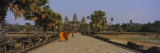 Two Monks Walking in Front of an Old Temple, Angkor Wat, Siem Reap, Cambodia