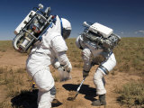Buy Two Astronauts Collect Soil Samples During Desert Rats Activity in Arizona at AllPosters.com