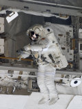 Buy Astronaut Participating in Extravehicular Activity at AllPosters.com