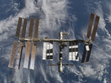 Buy International Space Station Backdropped by a Blue and White Earth at AllPosters.com