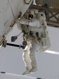 Buy Astronaut Participating in Extravehicular Activity at AllPosters.com
