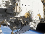 Buy Astronauts Participating in Extravehicular Activity at AllPosters.com