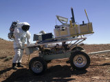 Buy Astronaut Standing at the Rear of a Science Trailer at AllPosters.com