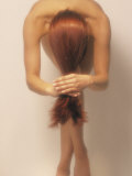 Nude Woman in Graceful Pose with Long Red Hair
