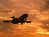 Silhouette of Commercial Airplane at Sunset