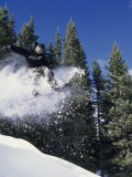 Airborne Man on Snowboard