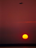 Sunset & Plane Over the Pacific Ocean