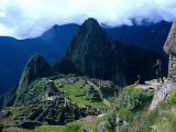 Tourists at Inca Ruins of Machu Picchu, Peru