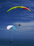 Two Paragliders Against the Sea and Sky