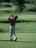 Buy Young Boy Playing Golf, Breckenridge, CO at AllPosters.com