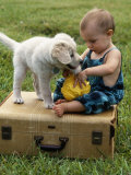 Baby Girl Playing with Puppy