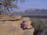 Buy Woman Mountain Biking, Sitting at AllPosters.com