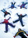 Kids Making Snow Angels