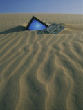 Computer Buried in Sand