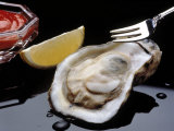 Oyster on Halfshell with Lemon and Sauce