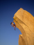 Buy Woman Climbing Cliff Wall at AllPosters.com