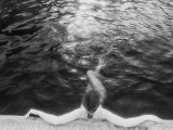 Buy Woman Relaxing in Swimming Pool at AllPosters.com