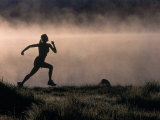 Silhouette of Woman Trail Running, CO