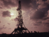 Silhouette of an Oil Rig at Sunset
