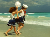 Buy Two Girls in Sailor Suits Running on Beach at AllPosters.com