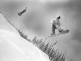 Snowboarders Airborne