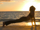 Buy Woman Stretching on Beach at AllPosters.com
