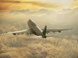 Buy Jumbo Jet Above Clouds at 35,000 Feet at AllPosters.com