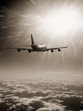 Airplane Flying Through Clouds