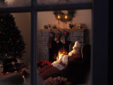 Santa Claus Asleep in Front of Fireplace
