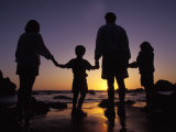 Buy Family Standing on the Beach at Sunset at AllPosters.com