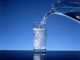 Buy Pitcher of Water Poured Into a Glass at AllPosters.com