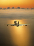 Airplane Flying Through Clouds Photographic Print