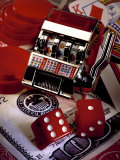 Dice, Slot Machine, Chips and Card on $100 Bill