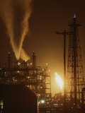 Buy Sparks and Flames Light up the Night Sky at a Power Plant at AllPosters.com